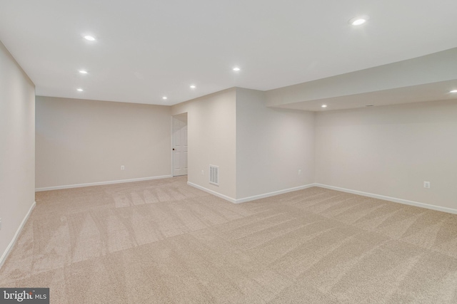 basement with light carpet