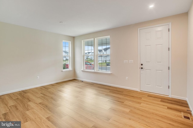 empty room featuring light hardwood / wood-style floors