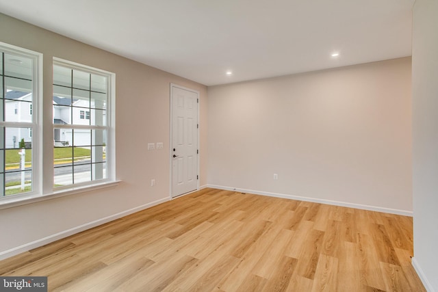 empty room featuring light hardwood / wood-style floors