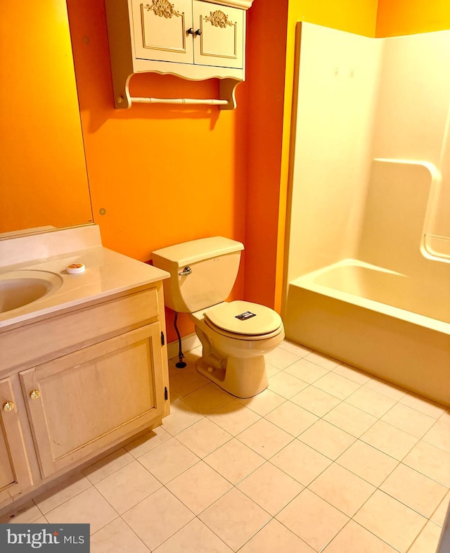 full bathroom featuring toilet, shower / tub combination, vanity, and tile patterned floors