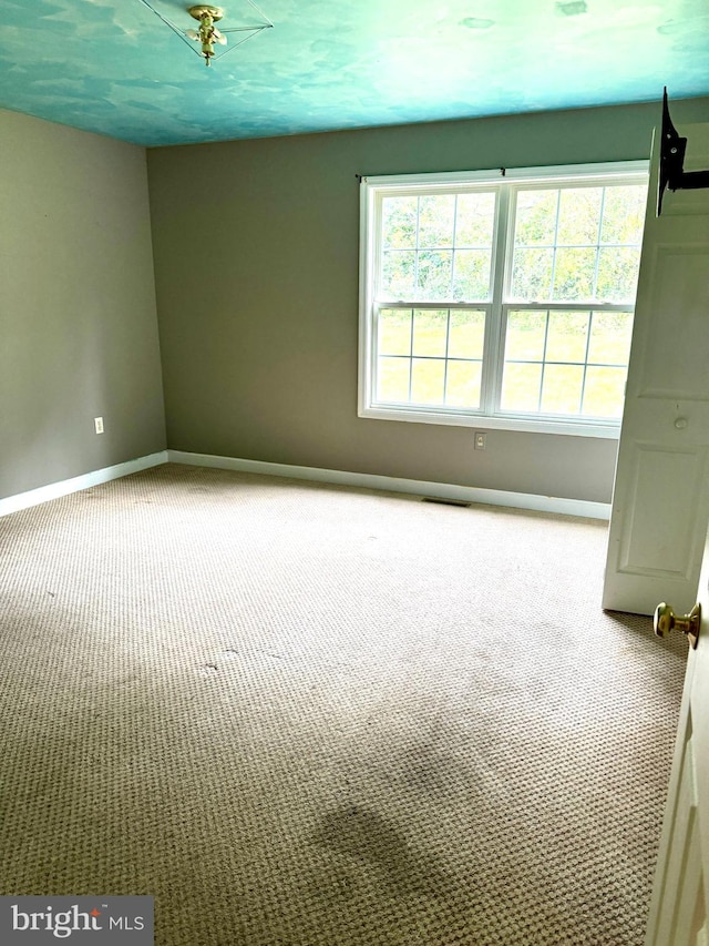 empty room with light carpet