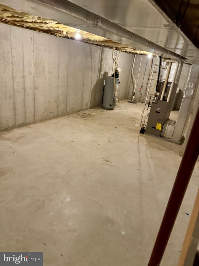 basement featuring gas water heater