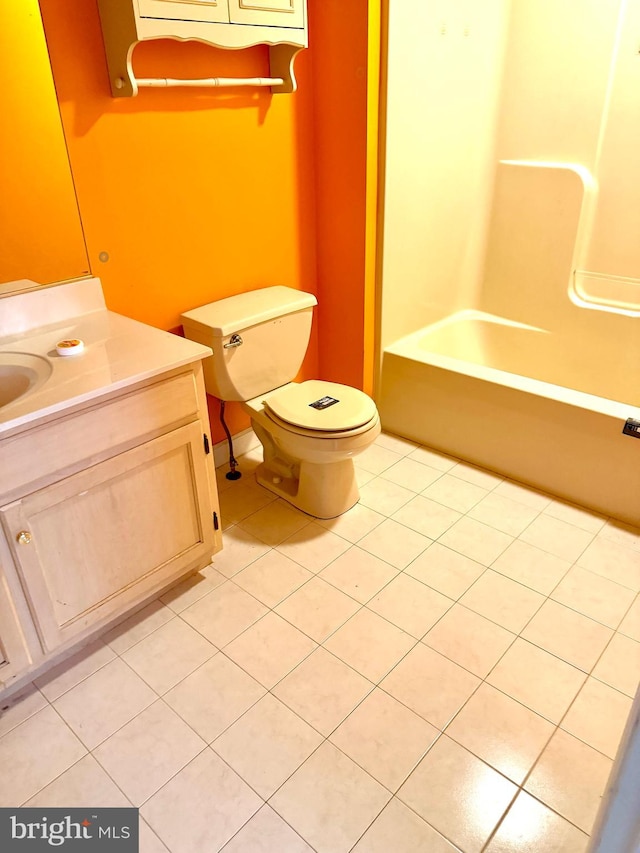 full bathroom with tile patterned flooring, vanity, toilet, and tub / shower combination