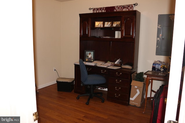 office area featuring electric panel and dark wood-type flooring