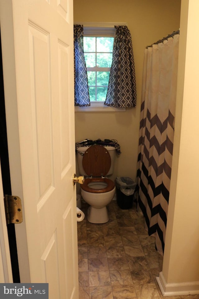 bathroom featuring toilet