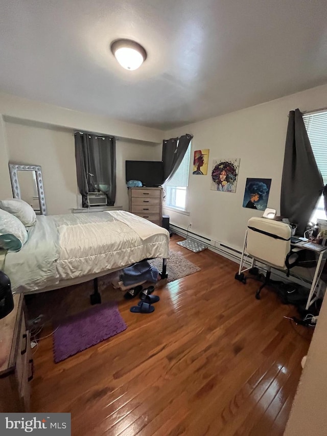 bedroom featuring dark hardwood / wood-style floors