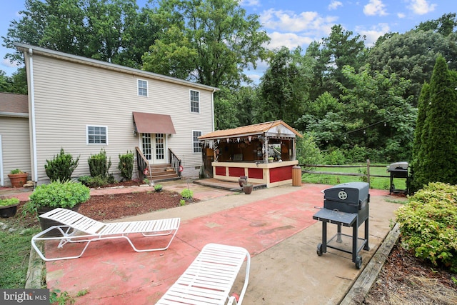 rear view of property with a patio area