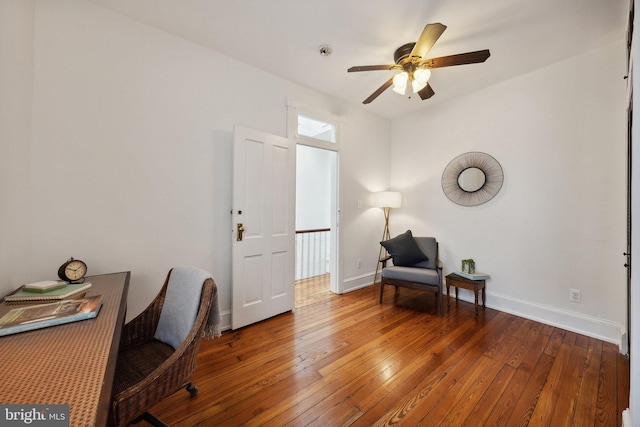 office featuring ceiling fan and hardwood / wood-style flooring