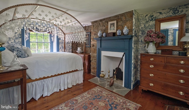 bedroom featuring dark wood-type flooring