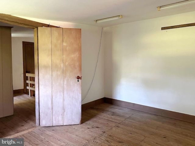 unfurnished bedroom featuring light hardwood / wood-style flooring