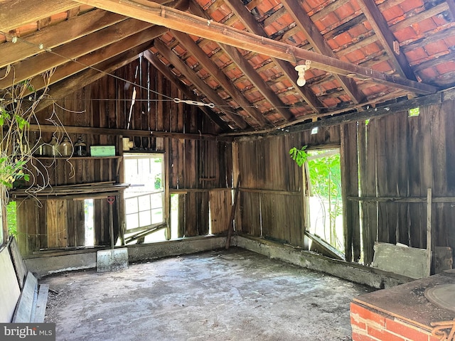 misc room with lofted ceiling