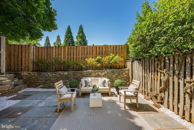 view of patio with an outdoor living space