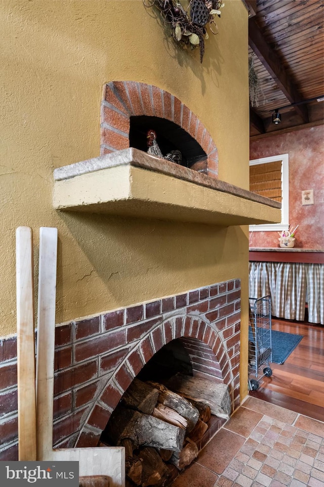 room details featuring hardwood / wood-style floors and wood ceiling