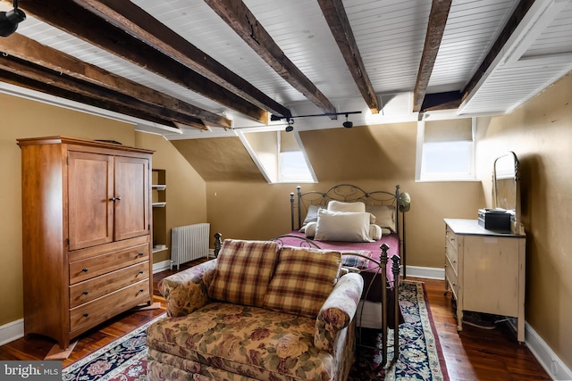 bedroom with beamed ceiling, dark hardwood / wood-style flooring, and radiator heating unit