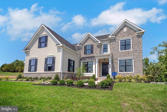 view of front of house with a front lawn