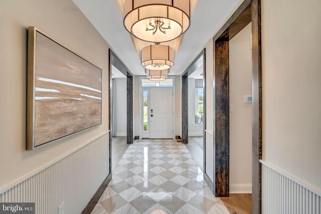 entrance foyer with an inviting chandelier