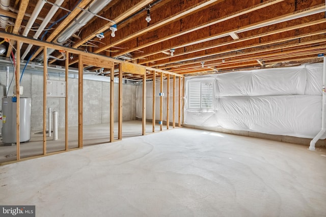 unfinished basement with water heater