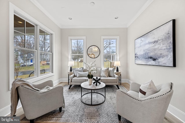 living room with hardwood / wood-style floors and crown molding