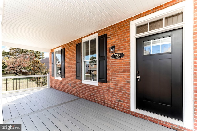 wooden deck with a porch