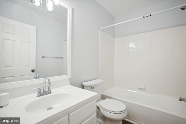 full bathroom with vanity, toilet, and tiled shower / bath