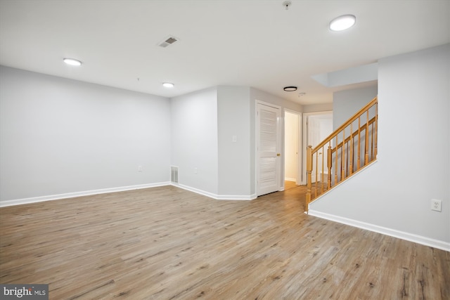 spare room with light wood-type flooring