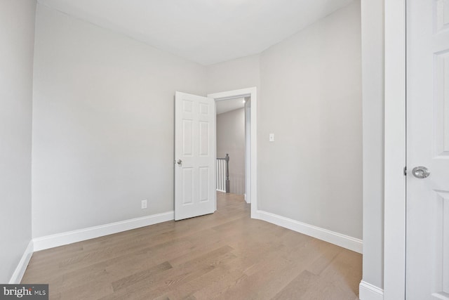 unfurnished room featuring light hardwood / wood-style floors