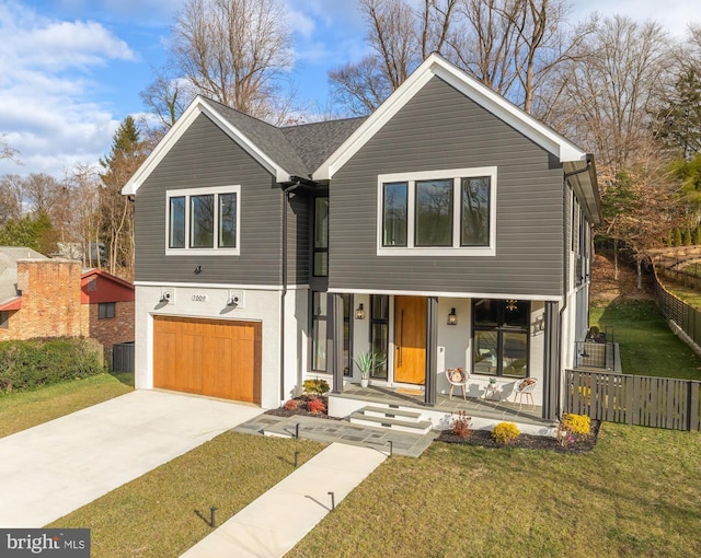 view of front of property with a front yard, a garage, covered porch, and central air condition unit