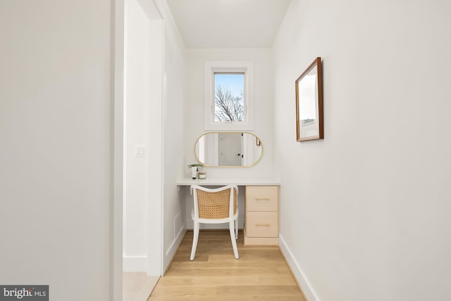 hallway featuring light hardwood / wood-style flooring