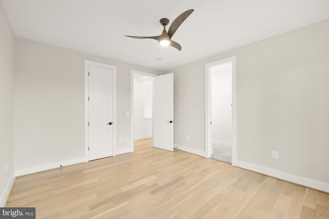 unfurnished bedroom with ceiling fan and light hardwood / wood-style flooring