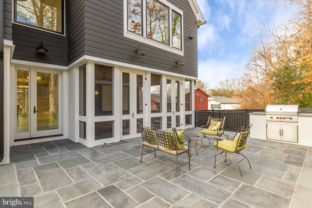 view of patio / terrace featuring french doors and a grill