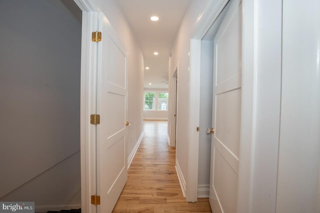 hall with light wood-type flooring