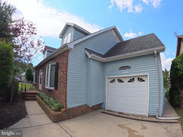 view of front of property featuring a garage