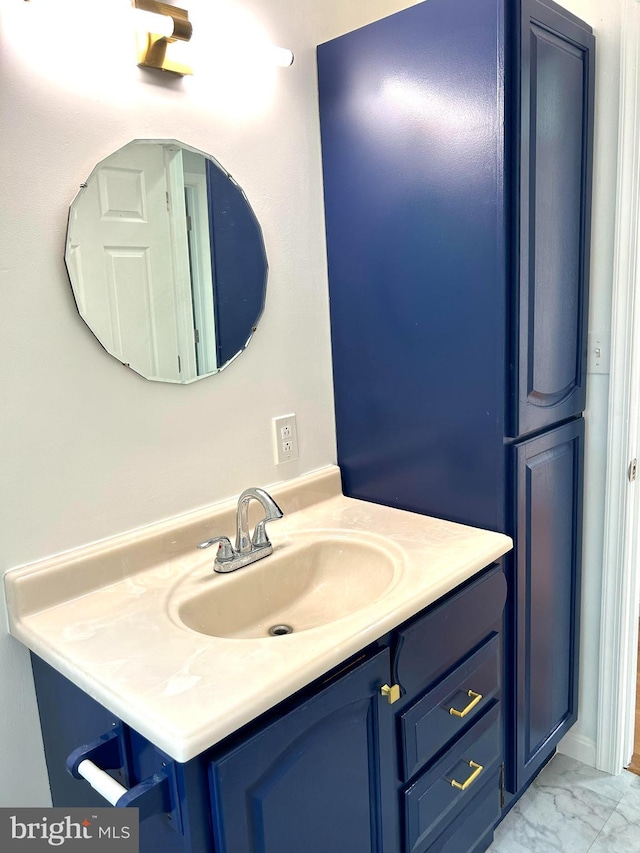 bathroom featuring tile patterned floors and vanity