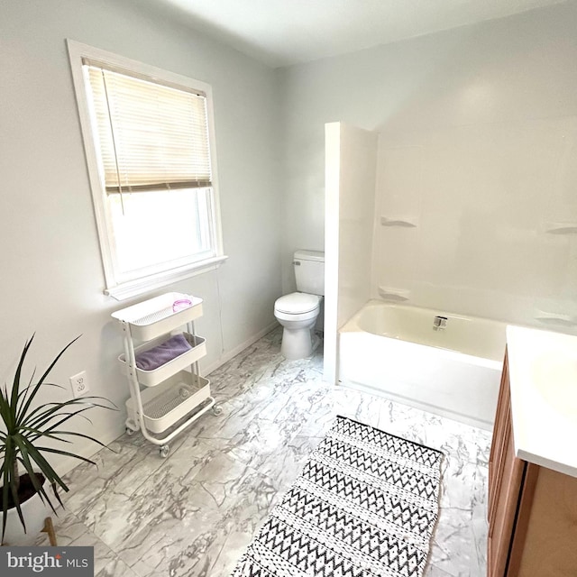 bathroom with vanity, tile patterned flooring, and toilet