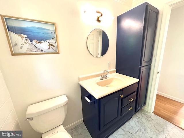 bathroom with tile patterned floors, toilet, and vanity