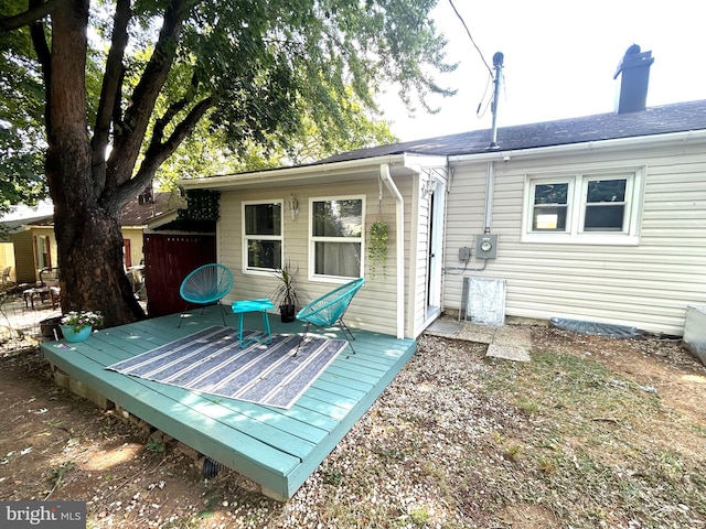 rear view of house with a deck