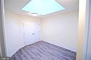 empty room featuring dark hardwood / wood-style floors