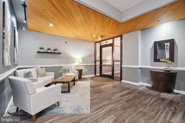 interior space featuring wood-type flooring and wood ceiling