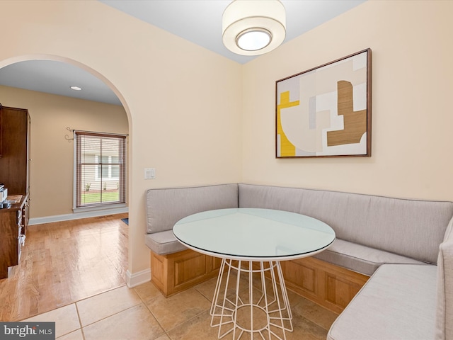 tiled dining area featuring breakfast area