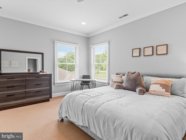 carpeted bedroom with crown molding