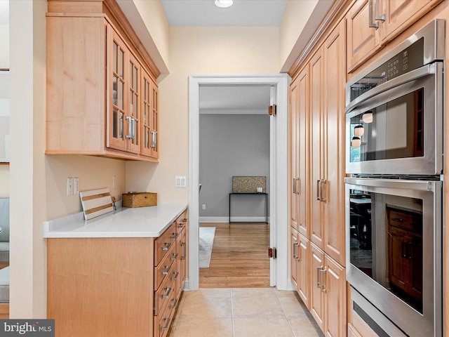 kitchen featuring light wood-type flooring and stainless steel appliances