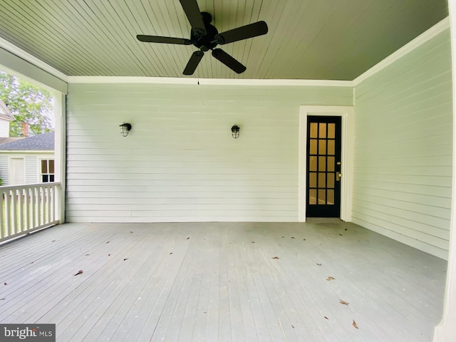 wooden deck with ceiling fan