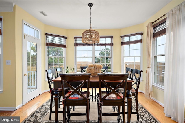 dining area with light hardwood / wood-style flooring