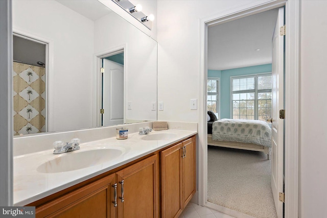 bathroom with vanity and tile patterned floors