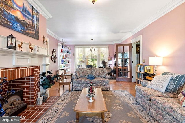 living room with a brick fireplace, ornamental molding, and hardwood / wood-style floors