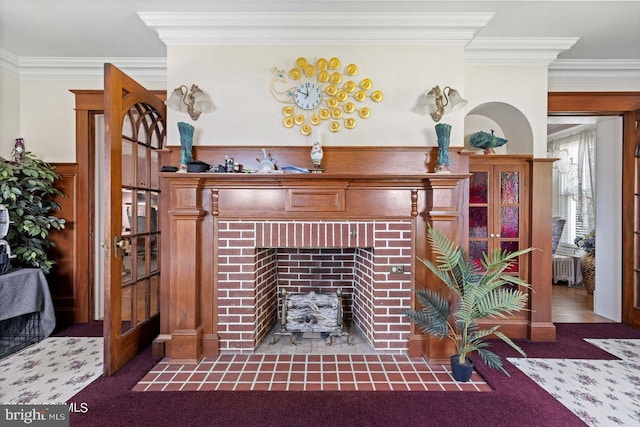 interior space featuring dark colored carpet and ornamental molding