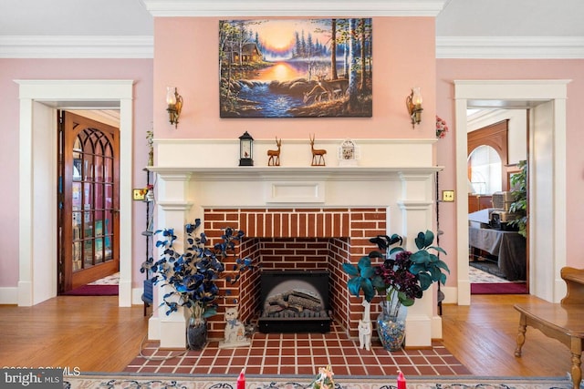 interior details featuring ornamental molding and hardwood / wood-style floors