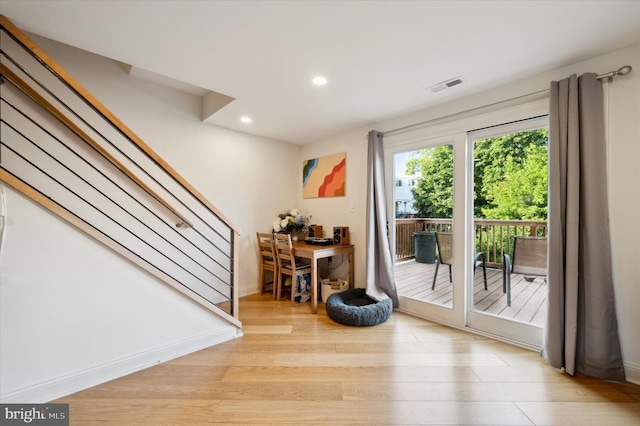 doorway with light hardwood / wood-style flooring