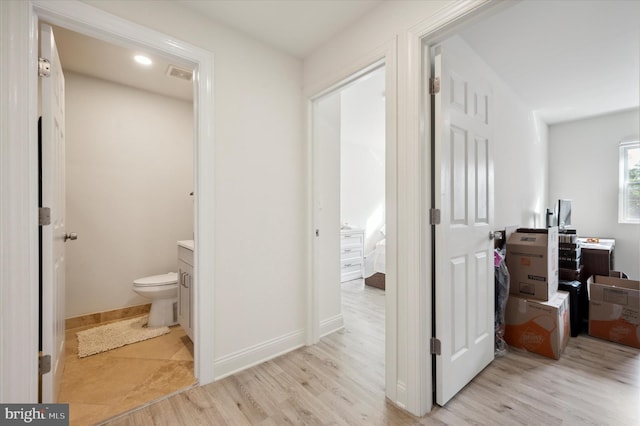 hallway featuring light hardwood / wood-style floors