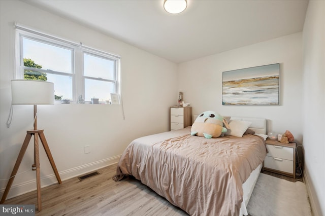 bedroom featuring light hardwood / wood-style flooring